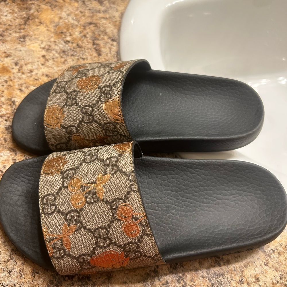 Gucci Tan and Black Patterned Slides